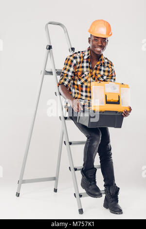 African American worker with tool box Stock Photo
