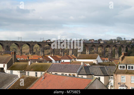 CrossCountry diesel express passenger Voyager train passing over the Royal Border Bridge, Berwick upon Tweed, Northumberland, England, UK Stock Photo