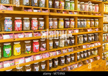 Jars of sweets, candy, lolly on shelves in old fashioned sweet shop, Tilba, NSW, New South Wales, Australia Stock Photo