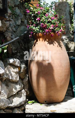 Eze old streets are very pretty and romantic , decorated with flowers Stock Photo