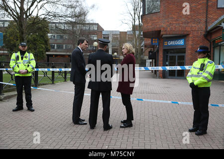 Home Secretary Amber Rudd (centre right) with Wiltshire Police Assistant Chief Constable Kier Pritchard (centre) and MP for Salisbury and South Wiltshire John Glen (centre left) visit the scene at the Maltings shopping centre in Salisbury where former Russian double agent Sergei Skripal and his daughter were found critically ill after exposure to a nerve agent. Stock Photo