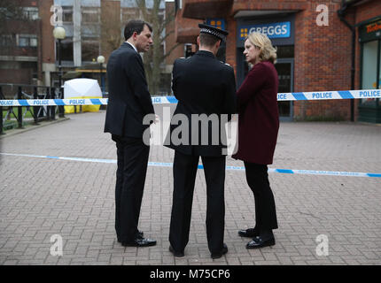 Home Secretary Amber Rudd (right) with Wiltshire Police Assistant Chief Constable Kier Pritchard (centre) and MP for Salisbury and South Wiltshire John Glen (left) visit the scene at the Maltings shopping centre in Salisbury where former Russian double agent Sergei Skripal and his daughter were found critically ill after exposure to a nerve agent. Stock Photo