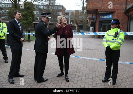 Home Secretary Amber Rudd (centre right) with Wiltshire Police Assistant Chief Constable Kier Pritchard (centre) and MP for Salisbury and South Wiltshire John Glen (left) visit the scene at the Maltings shopping centre in Salisbury where former Russian double agent Sergei Skripal and his daughter were found critically ill after exposure to a nerve agent. Stock Photo