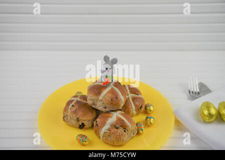 Easter time hot cross buns on white Stock Photo