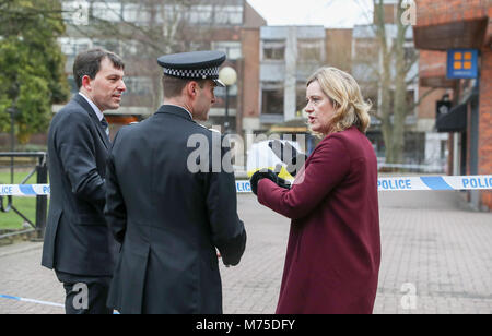 Home Secretary Amber Rudd (right) with Wiltshire Police Assistant Chief Constable Kier Pritchard (centre) and MP for Salisbury and South Wiltshire John Glen (left) visit the scene at the Maltings shopping centre in Salisbury where former Russian double agent Sergei Skripal and his daughter were found critically ill after exposure to a nerve agent. Stock Photo