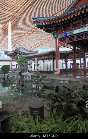 China, Beijing, Capital Airport, Terminal 3, interior, pavilion, pond, Stock Photo
