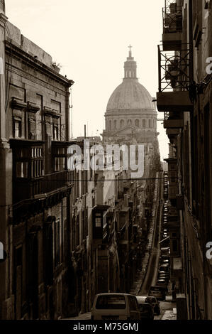 Mint Street in Valletta with the dome of the Carmelite Church, Malta, Europe Stock Photo