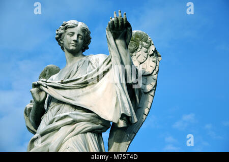 Angel statue holding the Holy Sudarium (Veronica's Veil) on Sant'Angelo Bridge in Rome, Italy Stock Photo
