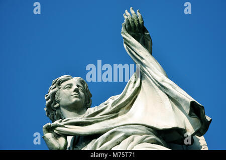 Angel statue holding the Holy Sudarium (Veronica's Veil) on Sant'Angelo Bridge in Rome, Italy Stock Photo