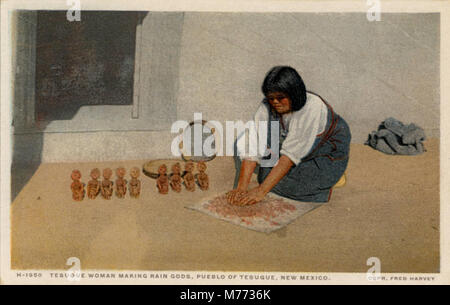 Tesuque woman making rain gods, Pueblo of Tesuque, New Mexico. Fred Harvey series. (NBY 21724) Stock Photo