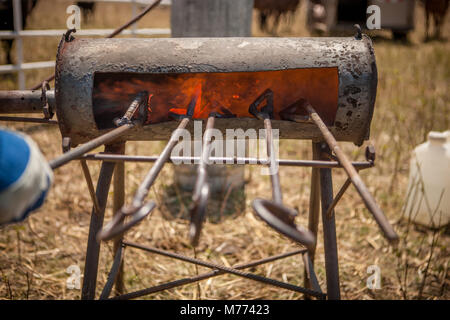 Branding irons in fire hi-res stock photography and images - Alamy