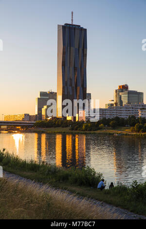 Donau City and DC building reflecting in New Danube River, Vienna, Austria, Europe Stock Photo