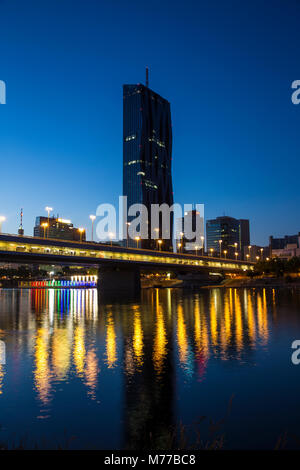 Donau City and DC building reflecting in New Danube River, Vienna, Austria, Europe Stock Photo