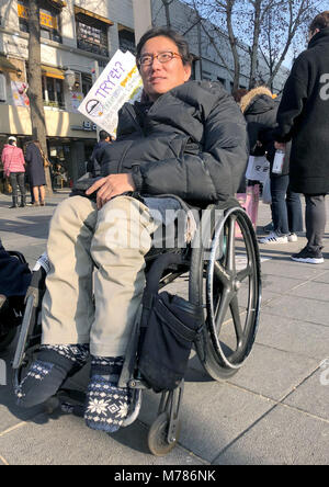 03 March 2018, South Korea, Seoul: Park Chano of South Korea, head of the Seoul Centre for Independent Living, taking part in a street demonstration for more rights for people with disabilities. Photo: Dirk Godder/dpa Stock Photo
