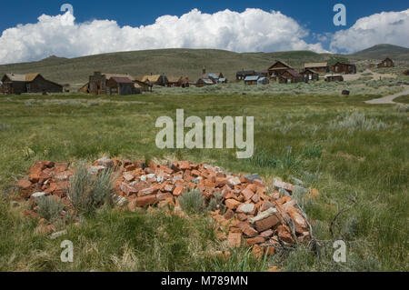 A pile of bricks, possibly placed to represent of an old grave, in ghost town Bodie, in Bodie State Historic Park, CA USA Stock Photo