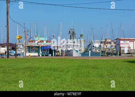 Part of the Waterfront view at Rockport on the Texas Coast, on a bright and breezy Summers day, with the Yachts and Boats in the background. Stock Photo