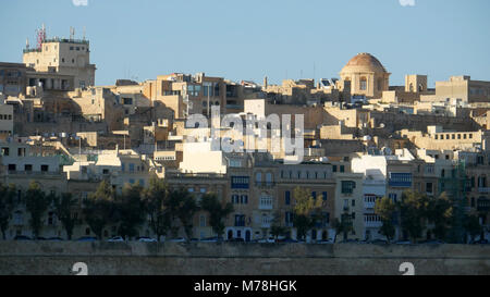 Central Valletta as seen from Senglea Peninsula. Buildings crammed together and ramparts to protect from invasion Stock Photo