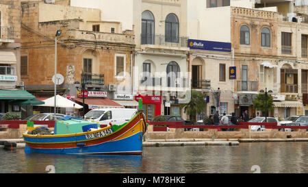 Fishing boats in the harbour and the waterfront at BellaVista in Malta Stock Photo