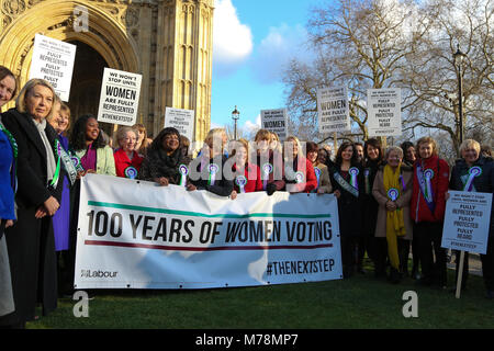 Labour Party launches a yearlong campaign outside Parliament to celebrate the centenary of women’s suffrage and look at how they can take the next steps to achieve full equality for women. Female members of the Shadow Cabinet and Labour politicians, wearing Labour styled suffragette rosettes with placards in front of a ‘100 Years of Women Voting’ banner.  Featuring: Diane Abbott, Emily Thornberry, Rebecca Long-Bailey, Angela Rayner, Kate Osamor, Sue Hayman, Cat Smith, Angela Smith - Baroness Smith of Basildon, Valerie Vaz, Debbie Abrahams, Nia Griffith, Barbara Keeley Where: London, United Kin Stock Photo