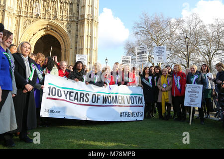Labour Party launches a yearlong campaign outside Parliament to celebrate the centenary of women’s suffrage and look at how they can take the next steps to achieve full equality for women. Female members of the Shadow Cabinet and Labour politicians, wearing Labour styled suffragette rosettes with placards in front of a ‘100 Years of Women Voting’ banner.  Featuring: Diane Abbott, Emily Thornberry, Rebecca Long-Bailey, Angela Rayner, Kate Osamor, Sue Hayman, Cat Smith, Angela Smith - Baroness Smith of Basildon, Valerie Vaz, Debbie Abrahams, Nia Griffith, Barbara Keeley Where: London, United Kin Stock Photo