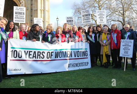 Labour Party launches a yearlong campaign outside Parliament to celebrate the centenary of women’s suffrage and look at how they can take the next steps to achieve full equality for women. Female members of the Shadow Cabinet and Labour politicians, wearing Labour styled suffragette rosettes with placards in front of a ‘100 Years of Women Voting’ banner.  Featuring: Diane Abbott, Emily Thornberry, Rebecca Long-Bailey, Angela Rayner, Kate Osamor, Sue Hayman, Cat Smith, Angela Smith - Baroness Smith of Basildon, Valerie Vaz, Debbie Abrahams, Christina Rees, Nia Griffith, Barbara Keeley, Lesley L Stock Photo