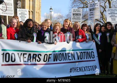 Labour Party launches a yearlong campaign outside Parliament to celebrate the centenary of women’s suffrage and look at how they can take the next steps to achieve full equality for women. Female members of the Shadow Cabinet and Labour politicians, wearing Labour styled suffragette rosettes with placards in front of a ‘100 Years of Women Voting’ banner.  Featuring: Diane Abbott, Emily Thornberry, Rebecca Long-Bailey, Angela Rayner, Kate Osamor, Sue Hayman, Cat Smith, Angela Smith - Baroness Smith of Basildon, Valerie Vaz, Debbie Abrahams, Christina Rees, Nia Griffith, Barbara Keeley, Lesley L Stock Photo