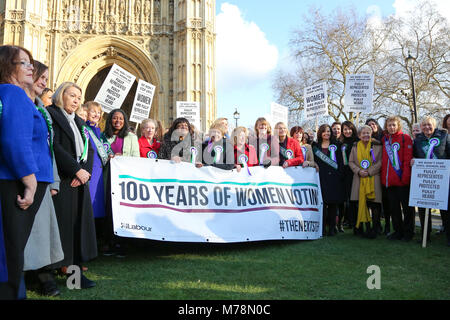 Labour Party launches a yearlong campaign outside Parliament to celebrate the centenary of women’s suffrage and look at how they can take the next steps to achieve full equality for women. Female members of the Shadow Cabinet and Labour politicians, wearing Labour styled suffragette rosettes with placards in front of a ‘100 Years of Women Voting’ banner.  Featuring: Diane Abbott, Emily Thornberry, Rebecca Long-Bailey, Angela Rayner, Kate Osamor, Sue Hayman, Cat Smith, Angela Smith - Baroness Smith of Basildon, Valerie Vaz, Debbie Abrahams, Christina Rees, Nia Griffith, Barbara Keeley, Lesley L Stock Photo