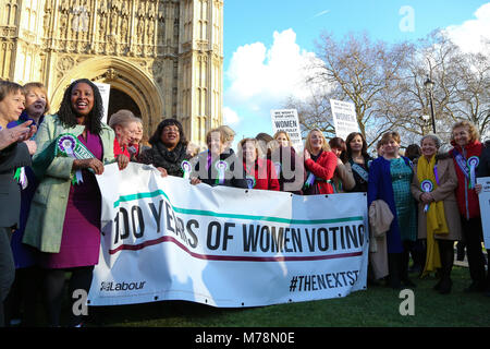 Labour Party launches a yearlong campaign outside Parliament to celebrate the centenary of women’s suffrage and look at how they can take the next steps to achieve full equality for women. Female members of the Shadow Cabinet and Labour politicians, wearing Labour styled suffragette rosettes with placards in front of a ‘100 Years of Women Voting’ banner.  Featuring: Diane Abbott, Emily Thornberry, Rebecca Long-Bailey, Angela Rayner, Kate Osamor, Sue Hayman, Cat Smith, Angela Smith - Baroness Smith of Basildon, Valerie Vaz, Debbie Abrahams, Christina Rees, Nia Griffith, Barbara Keeley, Lesley L Stock Photo