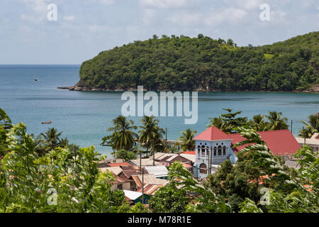 Church in the small town of Canaries, with Canaries Bay beyond, St. Lucia, Windward Islands, West Indies Caribbean, Central America Stock Photo
