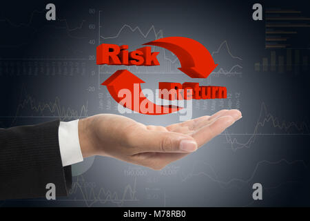 Risk and return symbol on hands. Stock Photo