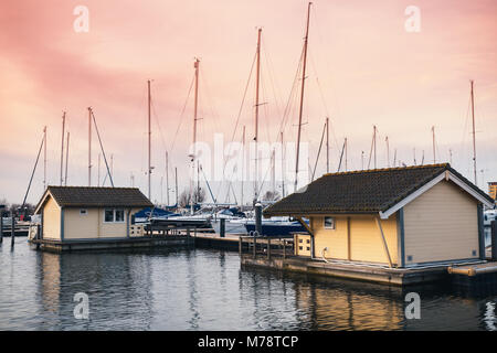 Sailing yachts and floating houses in Muiderzand marina, Amsterdam, Netherlands Stock Photo