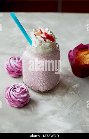 Pastel picture. Delicious dessert in pink tones.Marshmallow and milk strawberry cocktail Stock Photo