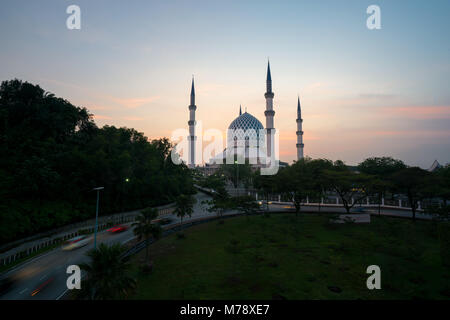 Salahuddin Abdul Aziz Shah Mosque (also known as the Blue Mosque, Malaysia) during sunrise located at Shah Alam, Selangor, Malaysia. Stock Photo