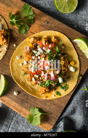 Healthy Homemade Sofritas Tofu Tacos with Tomato Onion and Cilantro Stock Photo