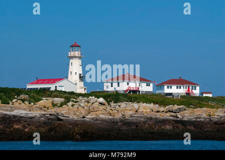 Machias Seal Island lighthouse is the only Canadian lighthouse manned by two keeper’s on the East Coast. Keepers each have their own building. Stock Photo