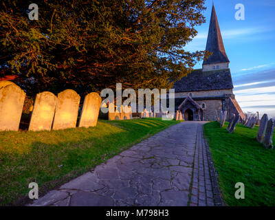 Winter sunset light on St Peters Ad Vincula (trans: St Peter in Chains) Church, Wisborough Green, West Sussex, UK. Stock Photo