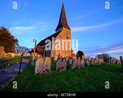 Winter sunset light on St Peters Ad Vincula (trans: St Peter in Chains) Church, Wisborough Green, West Sussex, UK. Stock Photo
