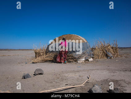 Afar tribe woman in front of her hut, Afar region, Semera, Ethiopia Stock Photo