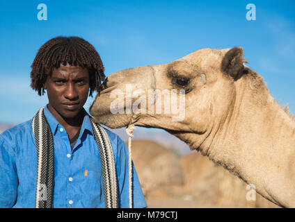 Afar tribe man with his camel, Afar region, Afambo, Ethiopia Stock Photo