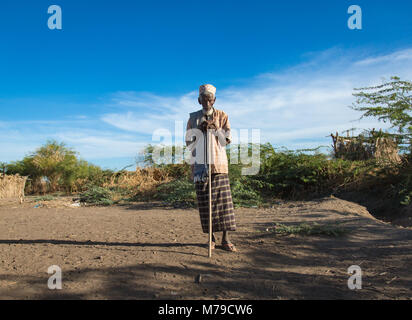 Afar tribe man in front of his village, Afar region, Afambo, Ethiopia Stock Photo