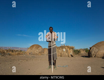 Afar tribe man in front of his village, Afar region, Afambo, Ethiopia Stock Photo