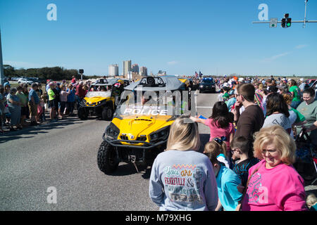 Gulf Shores, Alabama police vehicles press for crowd control before the Mardi Gras Parade. Stock Photo