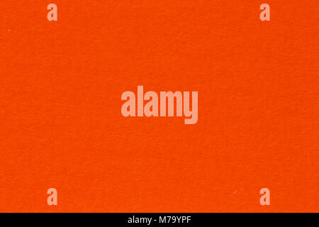 Close up of orange colored paper texture background. Stock Photo