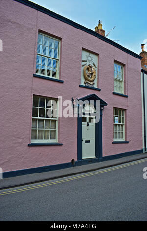 Arundel House 10 West Street, Axbridge Somerset. Note the unusual mermaid and fishes above the doorway. The property is Grade II Listed. Stock Photo