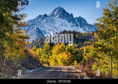 Mount Sneffels under snow, aspen grove in late fall, view from Dallas Creek Road, San Juan Mountains, Rocky Mountains, Colorado, USA