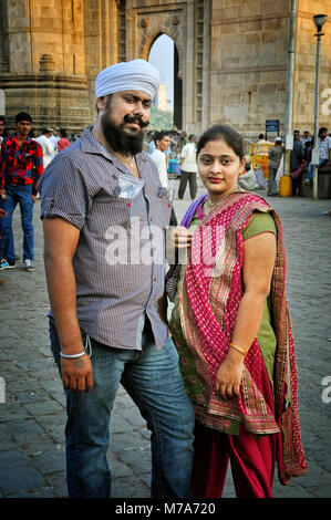 Young couple near the Gate of India, Mumbai, India Stock Photo