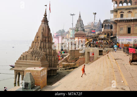 Manikarnika ghat (a cremation spot) along the Ganges river banks, Varanasi, India Stock Photo