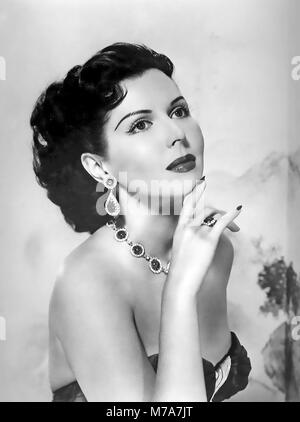 ANN MILLER (1923-2004) American dancer and film actress in 1957 Stock Photo