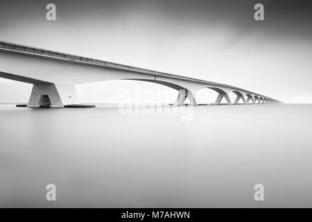 The Zeelandbrücke over the Osterschelde in black-and-white long time exposure