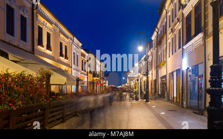 Nightlife of lighted Craiova streets in warm autumn, Romania Stock Photo